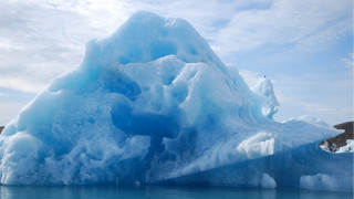 Iceberg ocean shore sky mountain - a rocky shore free wallpaper