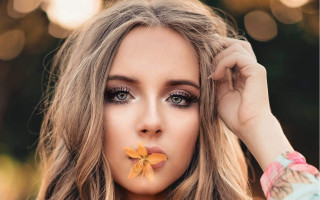 Woman flower nose mouth portrait - her nose free wallpaper
