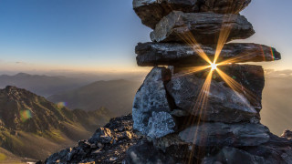 Rock sunshine mountains lens flare - the rock free wallpaper