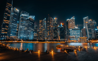 City skyline night water dock 7 - a dock in the foreground free wallpaper