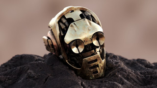Metal mask rock dirt dust - brown background free wallpaper
