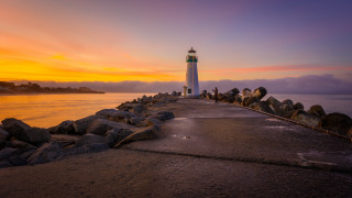 Lighthouse pier sunset clouds water - a pier free wallpaper