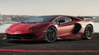 Red sports car black road - feature free wallpaper for desktop