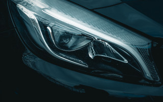 Car headlight closeup black white - a white background free wallpaper