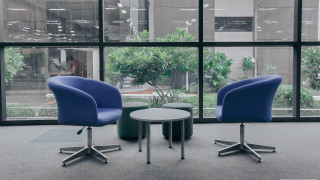 Chairs table largewindows plants indoor - a table in a room free wallpaper