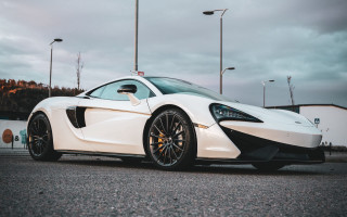 White sports car parking lot 4 - akseli gallenkallela free wallpaper