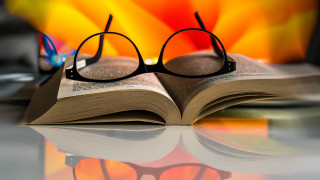 Book glasses fireplace lamp autumn - deep depth of field free wallpaper