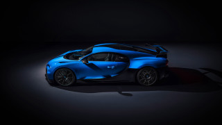Blue sports car dark room 15 - its hood open free wallpaper