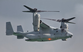 Military helicopter flying propellers precisionism - wing and a propeller free wallpaper