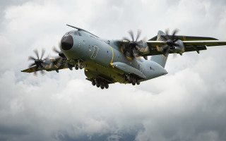 Military plane cloudy sky propellers 2 - a large military plane free wallpaper