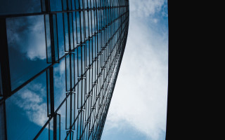 Tall building sky clouds plane - architecture free wallpaper