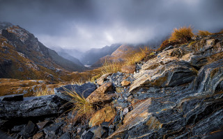 Rocky mountain grass cloudy sky - a grass free wallpaper