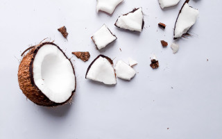 Half eaten coconut icing chocolate - a half free wallpaper