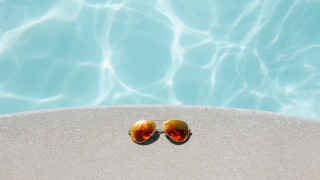 Sunglasses pool reflection summer beach - a reflection of the sun free wallpaper