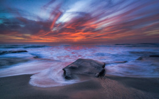 Rock beach sunset waves mountains - sandy free wallpaper