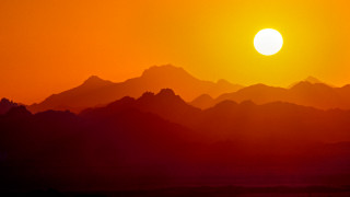 Sunset bird mountains orange sky 2 - the foreground and mountains free wallpaper