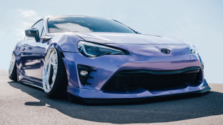 Blue sports car parking lot 21 - a blue sports car free wallpaper for desktop