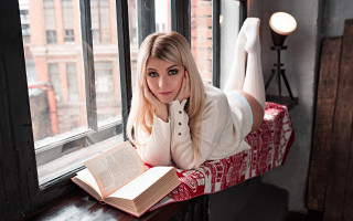 Woman reading window sill posing - contemporary fashion free wallpaper