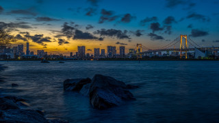 City skyline bridge sunset clouds - a bridge in the background free wallpaper