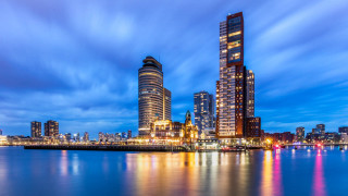 City skyline water night blue - a body of water in front free wallpaper