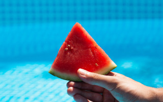 Watermelon pool summer minimalism beach - a person holding free wallpaper