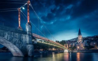 Night cityscape bridge tower lights - a bridge over a river free wallpaper