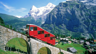 Red train bridge mountains mountain - a mountain range in the background free wallpaper
