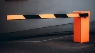 Yellow barricade parking lot night - blunt border free wallpaper