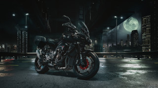 Motorcycle night city fullmoon skyline - a parking lot free wallpaper