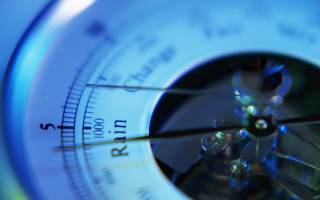 Compass closeup blue background blurry - shallow free wallpaper for desktop