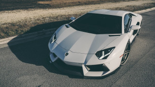 White sports car roadside grassy - a grassy area free wallpaper