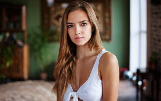 Woman white top green walls - free portrait wallpaper
