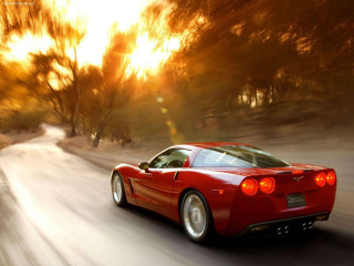 Red sports car driving road 30 - sunset free wallpaper