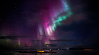 Aurora borealis night sky cityscape - the distance free wallpaper
