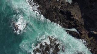 Rocky coastline waves ocean night - wave free wallpaper