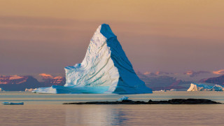 Iceberg mountains sunset ocean beach - a large iceberg free wallpaper