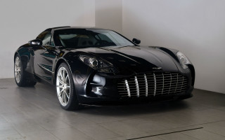 Black sports car garage white - a white wall behind free wallpaper
