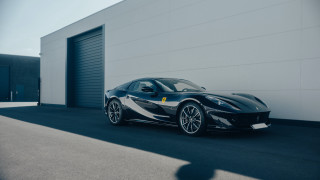 Black sports car garage white 2 - a white wall behind free wallpaper