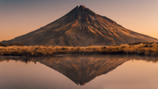 Mountain reflection dusk orange sky - a reflection free wallpaper