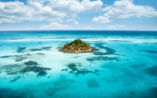 Island house boat ocean tiltshift - side and a boat free wallpaper
