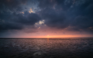 Sunset ocean boat clouds person - moody free wallpaper