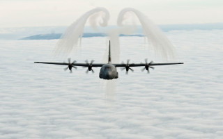 Airplane clouds smoke halo environmental - a large air plane free wallpaper