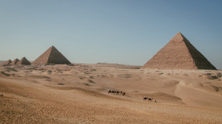 Desert camel riders pyramids blue - christo free wallpaper
