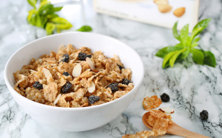 Cereal raisins almonds marble counter - a bowl of cereal free wallpaper