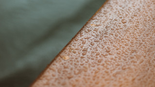 Leather water drops green background - a white cloth free wallpaper