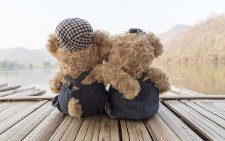 Teddy bears dock lake mountains - two teddy free wallpaper