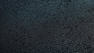 Black water drops yellow light - a white light free wallpaper