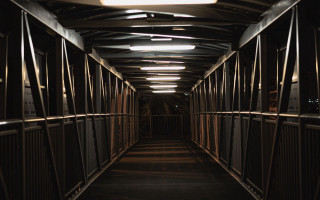 Long hallway metal fence clock - dynamic lighting free wallpaper