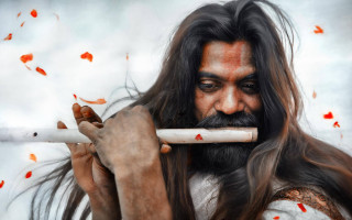 Long haired man smoking leaves - long hair holding free wallpaper