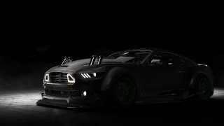 Black car green wheels dark - a black car free wallpaper